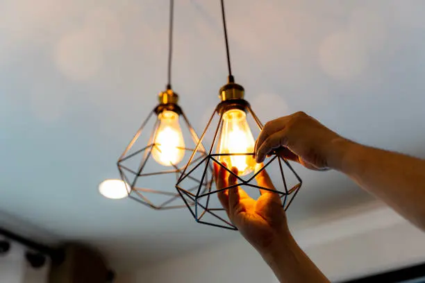 Feature pendant install for a coastal renovation.